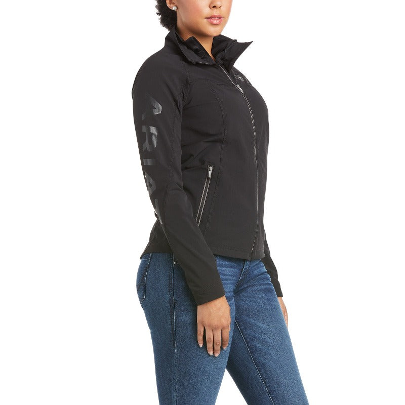Women's Ariat Agile Softshell Water Resistant Jacket, Team Black SKU # 10035015 Lightweight technical softshell •	Abrasion-resistant •	Performance seaming •	Two-way zipper •	Storm cuffs •	3D gel branding at arm •	Wind and water resistant •	81% nylon, 10% spandex, and 9% polyester